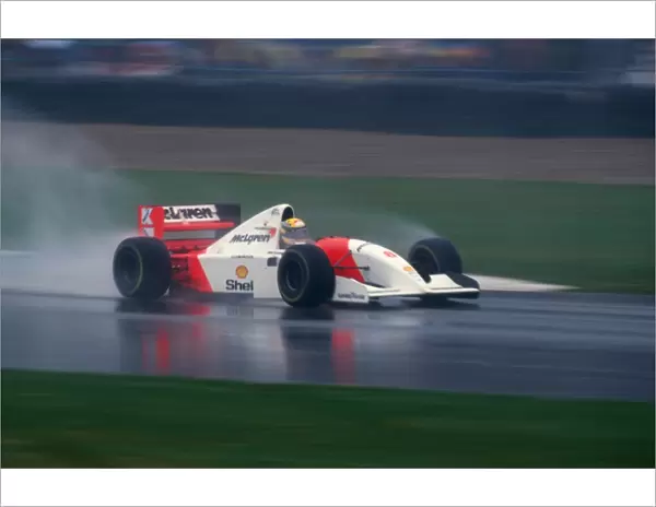Formula One World Championship: Ayrton Senna McLaren MP4  /  8 took a dominant victory in the difficult conditions