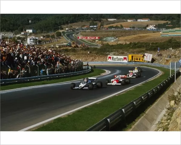 Formula One World Championship: Nelson Piquet is chased by race winner Alain Prost and Ayrton Senna