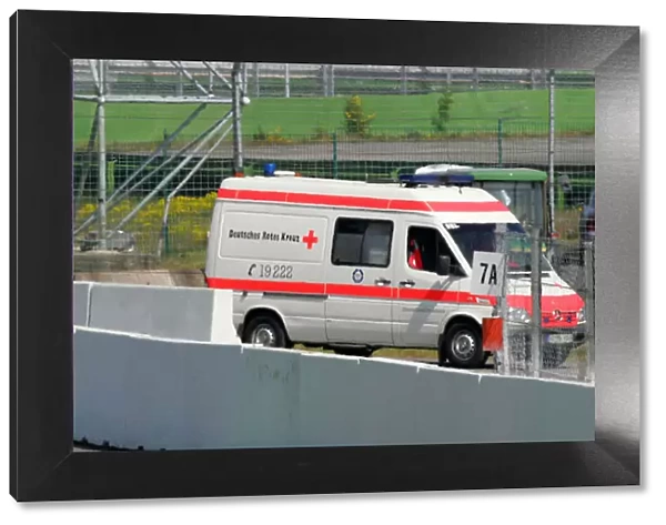 DTM. An ambulance leaves the scene of an accident involving Tom Kristensen 