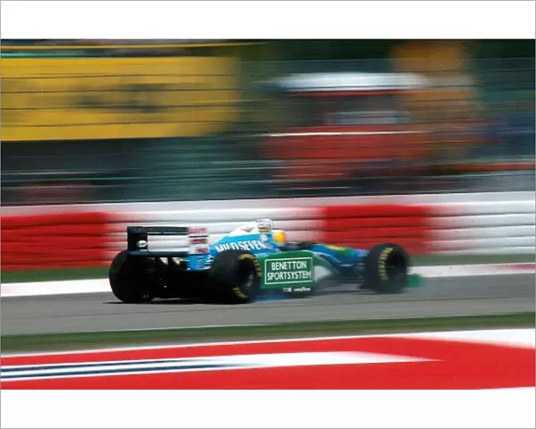 Formula One World Championship: Michael Schumacher Benetton B194 slides backwards during a spin during practice