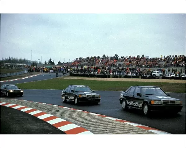 Mercedes-Benz 190E Cup: Jody Scheckter leads Manfred Schurti and Klaus Ludwig in the Mercedes 190E race held to mark the opening of the new Nurburgring