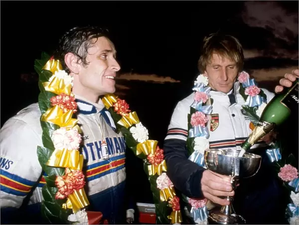 Le Mans 24 Hours: Race winners Jacky Ickx and Derek Bell Rothmans Porsche celebrate victory