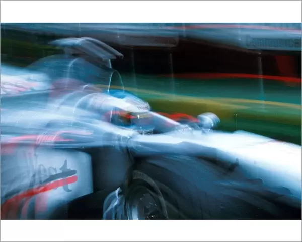 Formula One World Championship: Race winner Mika Hakkinen McLaren Mercedes MP4  /  13