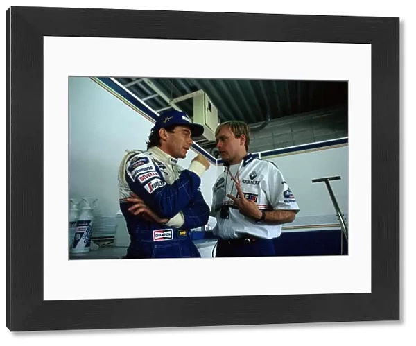 Formula One World Championship: Pole Sitter Ayrton Senna Williams FW16 with his Race Engineer David Brown