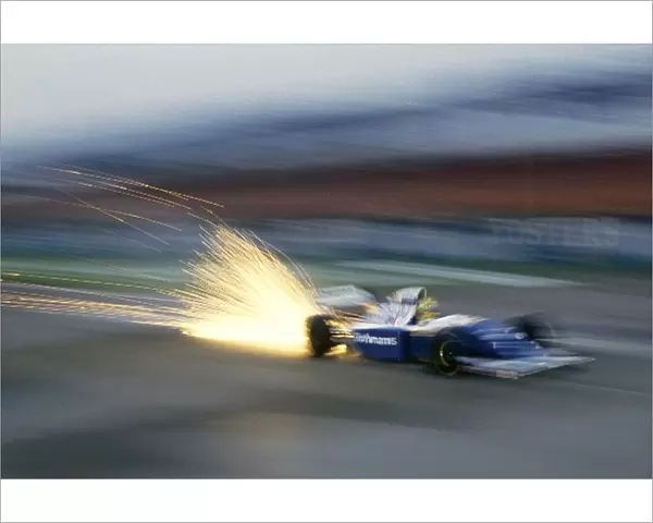 Formula One World Championship: The Williams FW16 of Ayrton Senna sends out a shower of sparks whilst testing before the opening race of the season