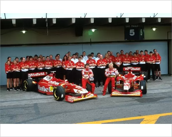 Formula One World Championship: Heinz-Harald Frentzen Williams, Jacques Villeneuve Williams and the rest of Williams Team pose for a Team Picture