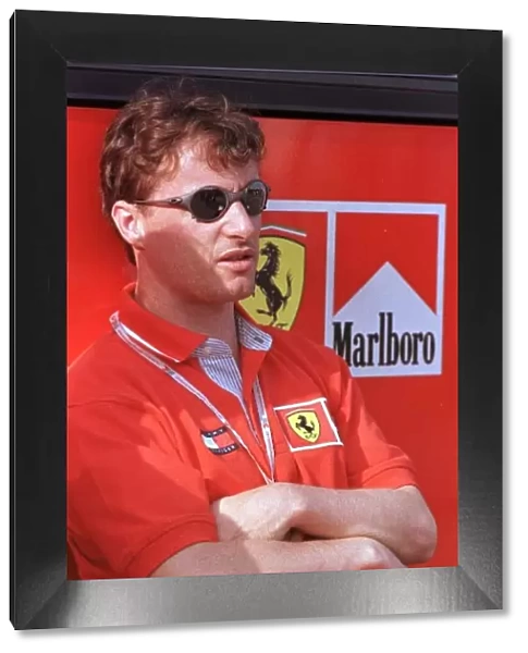 1998 SAN MARINO GP. Eddie Irvine, Ferrari relaxes after qualifying 4th