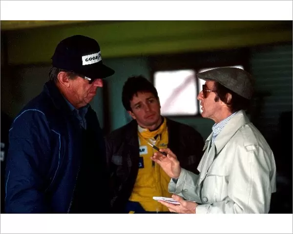 Formula One World Championship: Martin Brundle chats with Ken Tyrrell left, and Jackie Stewart right