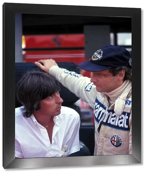 Formula One World Championship: Brabham Team Manager Herbie Blash chats with Niki Lauda Brabham