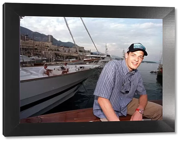 1998 MONACO GP. Alexander Wsrz sits on Luciano Benettons yacht in the Harbour relaxin