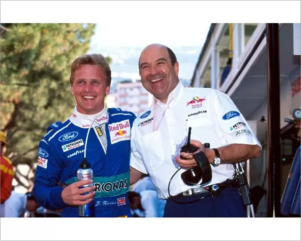 Formula One World Championship: Peter Sauber, right congratulates Johnny Herbert on 3rd place