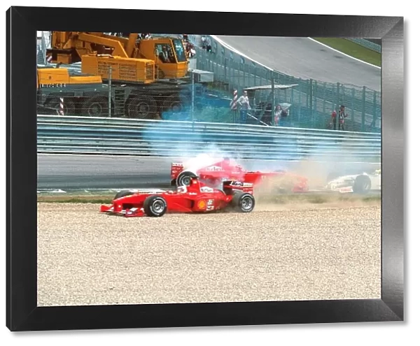 Formula One World Championship: Schumacher spins out after an incident with Zonta at the start