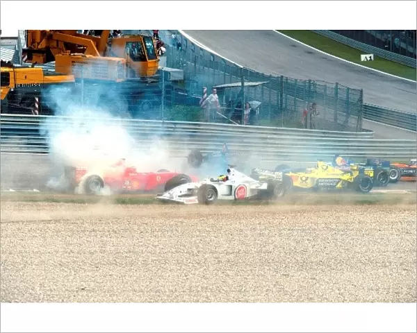 Formula One World Championship: Schumacher spins out afte an incident with Zonta at the start