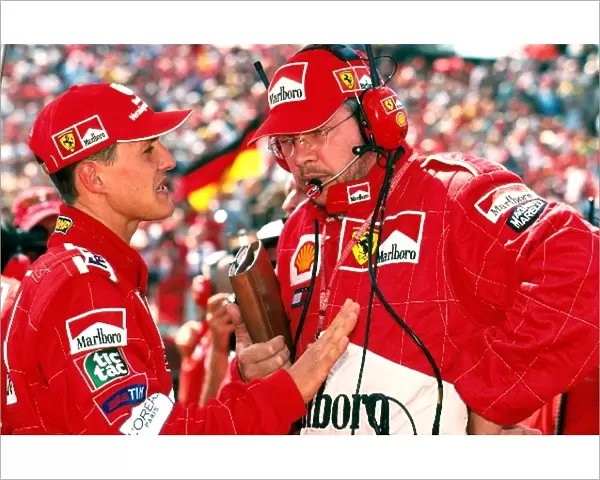 Formula One World Championship: Michael Schumacher Ferrari F1 2000 with Ross Brawn, Ferrari technical director