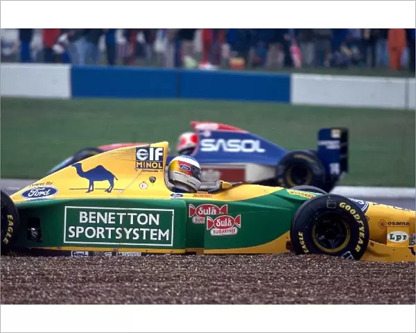 Formula One World Championship: Michael Schumacher Benetton Ford B193B spins out of the race