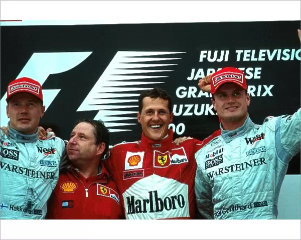 Formula One World Championship 2000: L to R: Mika Hakkinen 2nd, Jean Todt, Winner Michael SchumacherFerrari F1 2000 and David Coulthard 3rd