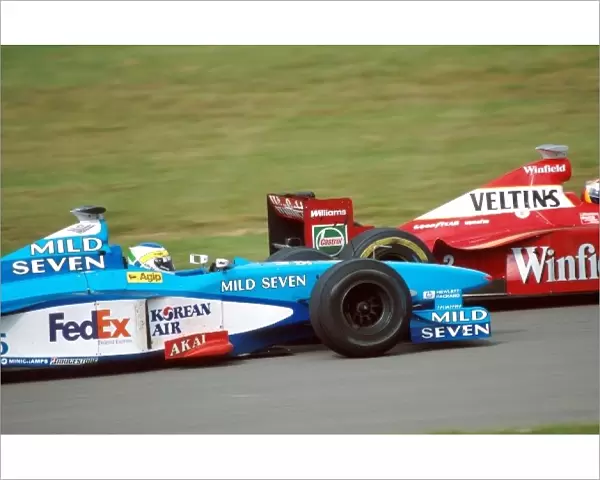 Formula One World Championship: Heinz-Harald Frentzen, Willams FW20, 5th place, passes Giancarlo Fisichella, Benetton B198, 6th place