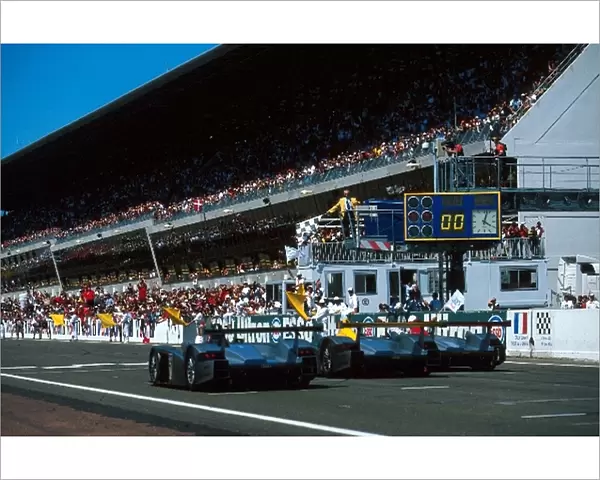 Le Mans: Emanuele Pirro crosses the line for an Audi 1-2-3: Le Mans 24 Hour Race - La Sarthe, France, 17-18 June 2000