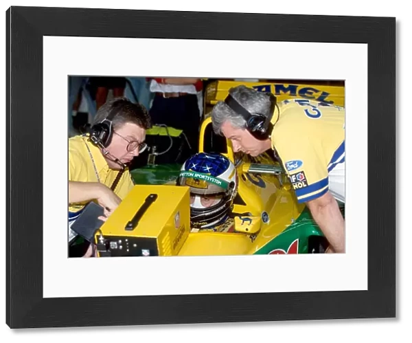 Formula One World Championship: Michael Schumacher Benetton B193 Ford with Ross Brawn Benetton Technical Director and race engineer Pat Symonds