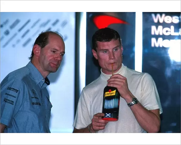 Formula One World Championship: David Coulthard Mclaren MP4-15 in discussion with Mclaren chief designer Adrian Newey