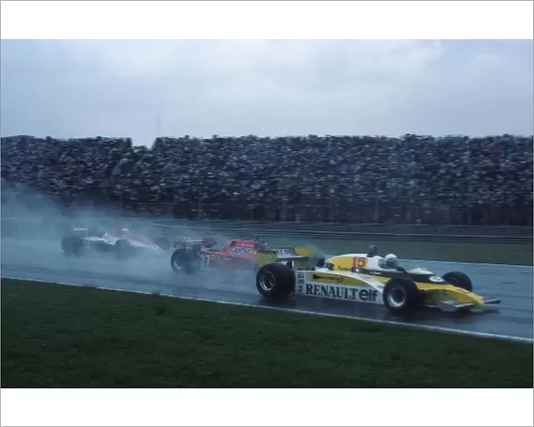 Formula One World Championship: Rene Arnoux Renault RE20B retired on the first lap after an accident, here being hit by Villeneuve with Marc