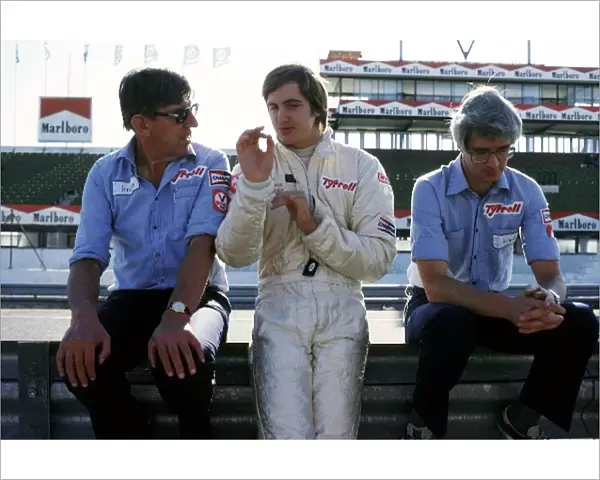 Formula One World Championship: Ken Tyrrell Tyrrell Team Owner talks with Eddie Cheever Tyrrell, who crashed out of the race on lap 47 after