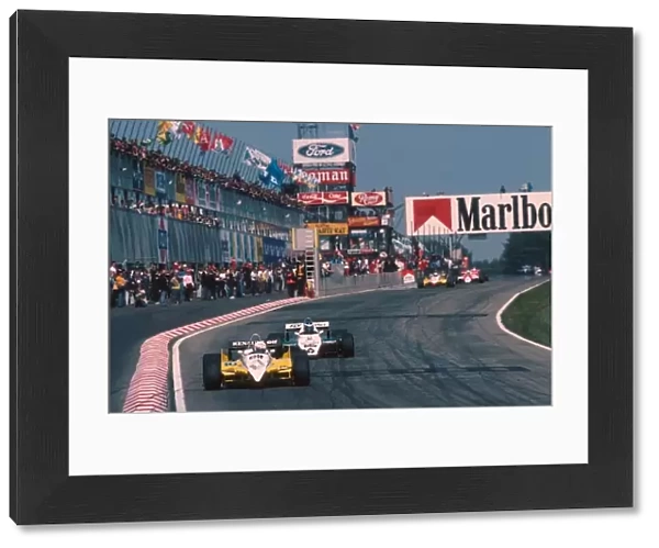 Formula One World Championship: Rene Arnoux Renault RE30B leads Keke Rosberg