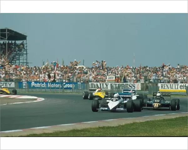 Formula One World Championship: Riccardo Patrese leads the Lotus of Elio de Angelis and the second Brabham of Nelson Piquet