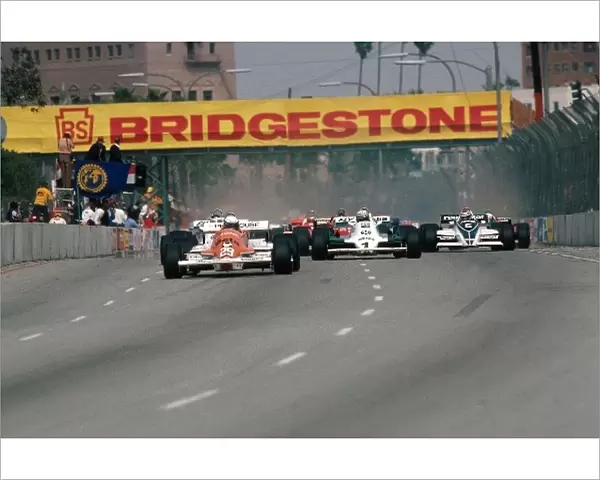 Formula One World Championship: Riccardo Patrese Arrows A3 leads from pole position at the start. He led for 24 laps