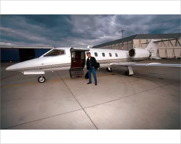 Formula One World Championship: Damon Hill with the Lear Jet that he uses to fly to the races