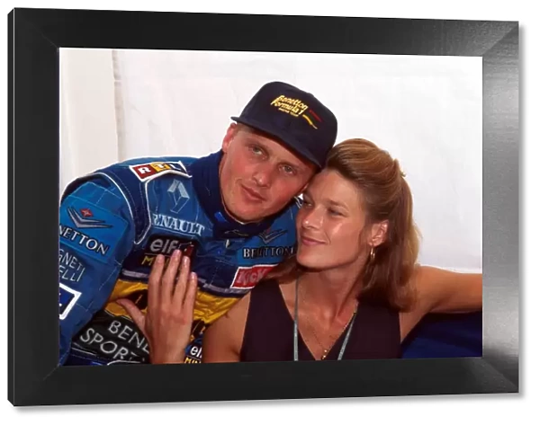 Formula One World Championship: Johnny Herbert celebrates his first GP victory with his wife Becky