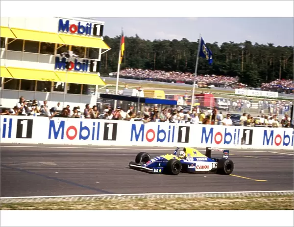 Formula One World Championship 1991: Nigel Mansell Williams FW14 celebrates his race victory at the end of the race