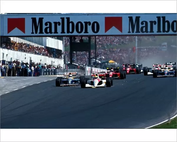 Formula One World Championship: Ayrton Senna McLaren MP4  /  6 leads at the start of the race