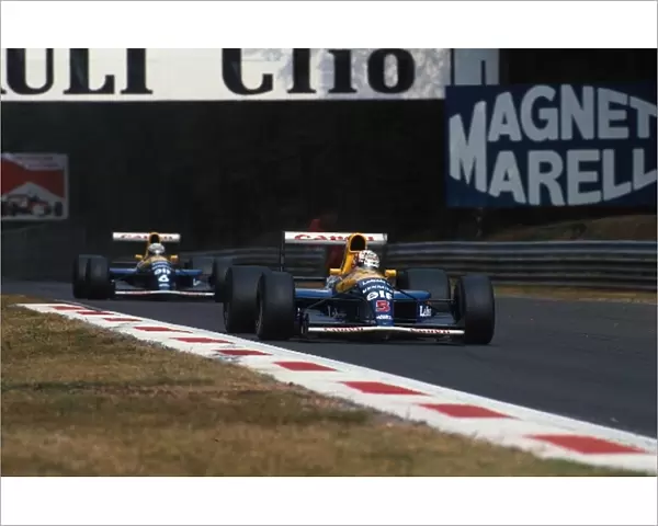 Formula One World Championship: Nigel Mansell Williams FW14 leads team mate Riccardo Patrese on his way to victory