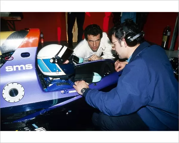 Formula One World Championship: David Brabham in the Simtek S941 talks with team mate Roland Ratzenberger and Nick Wirth Simtek Team Principal