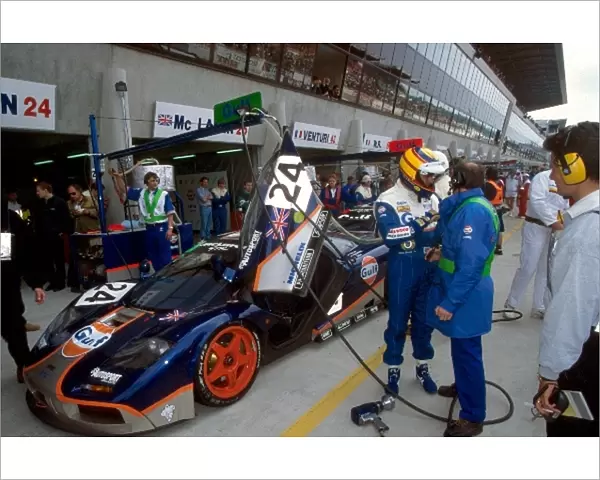Le Mans 24 Hours: Mark Blundell exits the GTC Gulf Racing McLaren F1 GTR during a pit stop