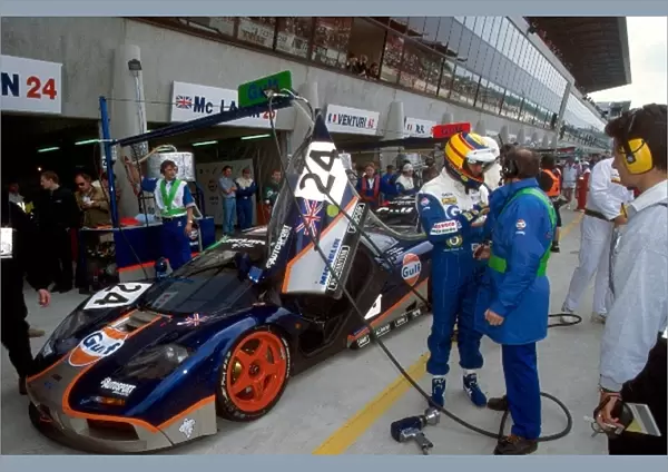 Le Mans 24 Hours: Mark Blundell exits the GTC Gulf Racing McLaren F1 GTR during a pit stop