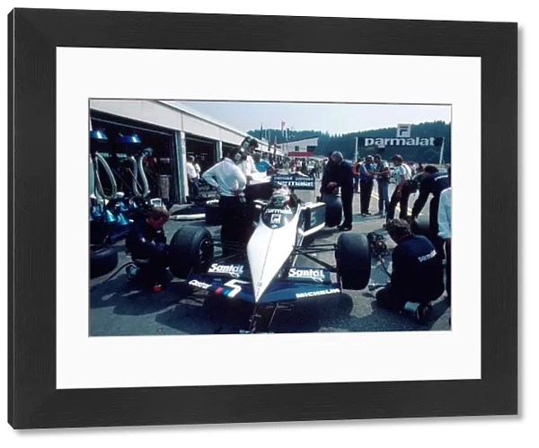 Formula One World Championship: The Brabham of Nelson Piquet recieves some attention from his mechanics in the pits