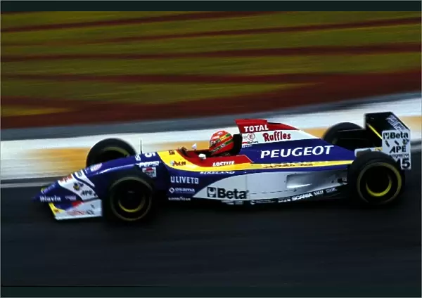 Formula One World Championship: Eddie Irvine Jordan Peugeot 195, retired on lap 16
