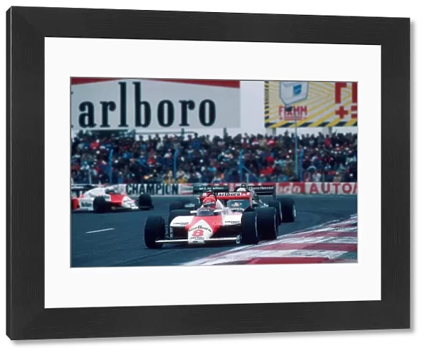 Formula One World Championship: The McLaren of Niki Lauda leads the Lotus of Elio de Angelis, the Tyrrell of Michele Alboreto and the Alfa Romeo