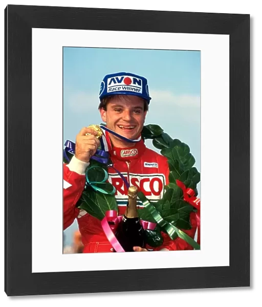 British Formula Three Championship: Rubens Barrichello West Surrey Racing  /  Arisco Ralt RT-35 Mugen grasps his winners medal and champagne