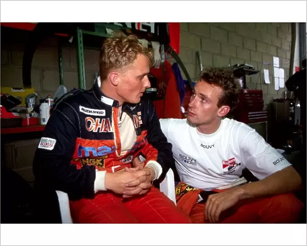Le Mans 24 Hours: L-R: Johnny Herbert talks with Mazda teammate Bertrand Gachot