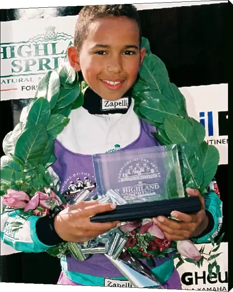 Lewis Hamilton Career History: Lewis Hamilton winning the McLaren Mercedes Champions of the Future series during his karting career