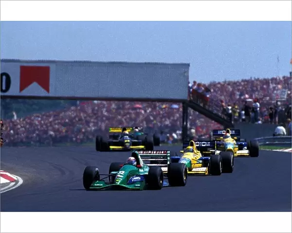 Formula One World Championship: Bertrand Gachot Jordan Ford 191, leads Roberto Moreno Benetton Ford B191 and his team mate Nelson Piquet