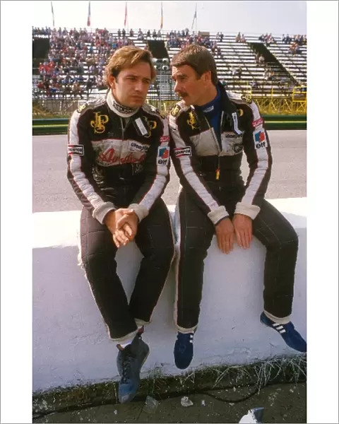Formula One World Championship: Team mates Elio de Angelis, left, and Nigel Mansell talk on the pit wall