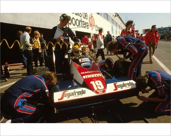 Formula One World Championship: Ayrton Sennas Toleman recieves some attention in the pits