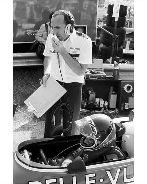 Formula One World Championship: Frank Williams Williams Team Owner talks with Patrick Neve Williams Grand Prix Engineering March 761, who claimed