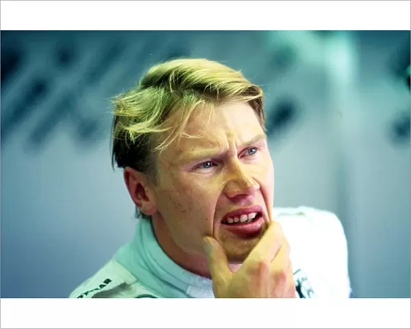 Formula One World Championship: Mika Hakkinen Mclaren sees his provisional pole position time beaten in the dying seconds of qualifying