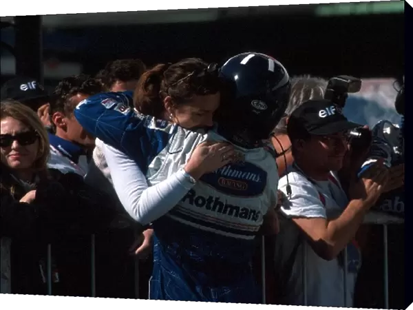Formula One World Championship: Winner Damon Hill Williams FW18 is greeted by his wife Georgie