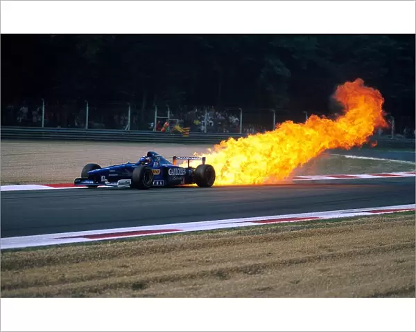 Formula One World Championship: Jarno Trulli Prost AP01 has a huge oil fire during practice